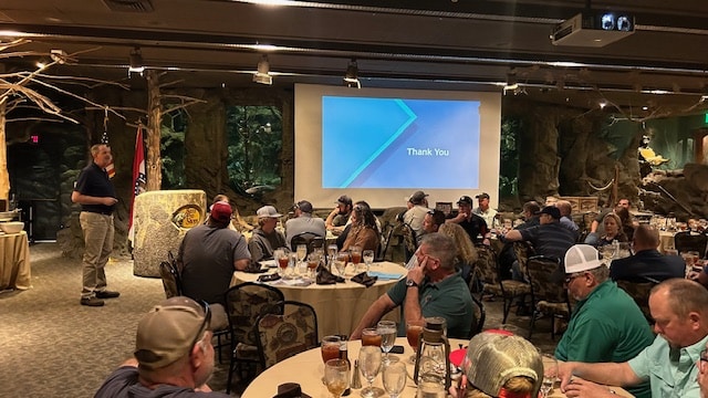 A dinner presentation event at Bass Pro Uncle Buck's