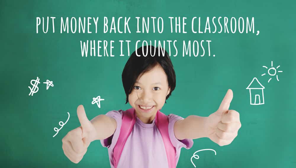 Young student in front of chalkboard that says "Put Money Back Into the Classroom, Where it Counts Most."