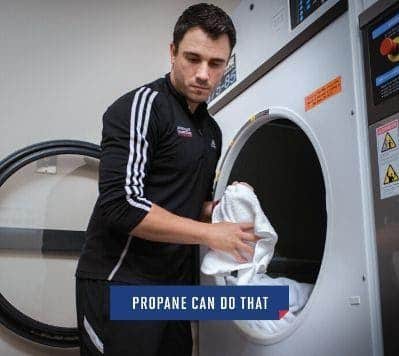 Man using propane dryer in commercial business