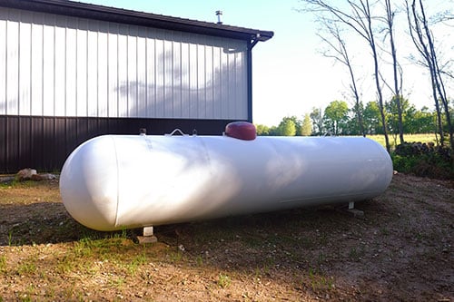 A large propane tank at a rural Missouri residence